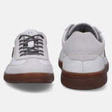 A white Men's bugatti Sneakers featuring a round toe plain toe, zero heels heel, and a wide fit. Made from suede leather with a durable tpr outsole, this laces design offers both style and comfort.