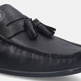 A black Men's bugatti Mules featuring a round plain toe, zero heels heel. Made from premium genuine leather with a durable tpr outsole, this slip-on design offers both style and comfort.
