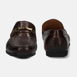 A brown Men's bugatti Casual Loafers featuring a square toe apron toe, zero heels heel. Made from patent leather with a durable tr outsole, this slip-on design offers both style and comfort.