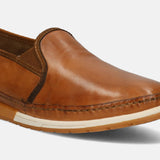 A brown Men's bugatti Slip-On Sneakers featuring a round toe plain toe, zero heels heel. Made from premium genuine leather with a durable tpr outsole, this slip-on design offers both style and comfort.