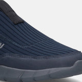 A blue Men's bugatti Athileisure Sneakers featuring a round toe plain toe, zero heels heel. Made from textile with a durable eva outsole, this slip-on design offers both style and comfort.
