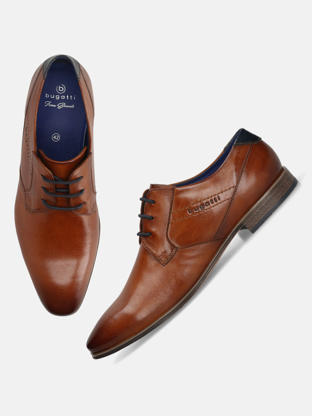 Men's Bugatti derby cognac leather shoes with a pointed toe and plain toe featuring a moulded heel , a pvc outsole , and laces fastening.