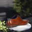 Men's Bugatti derby cognac leather shoes with a pointed toe and plain toe featuring a moulded heel , a pvc outsole , and laces fastening.
