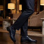bugatti Livorno Flex Evo dark blue leather derby formal shoes, paired with dark socks and tailored trousers.