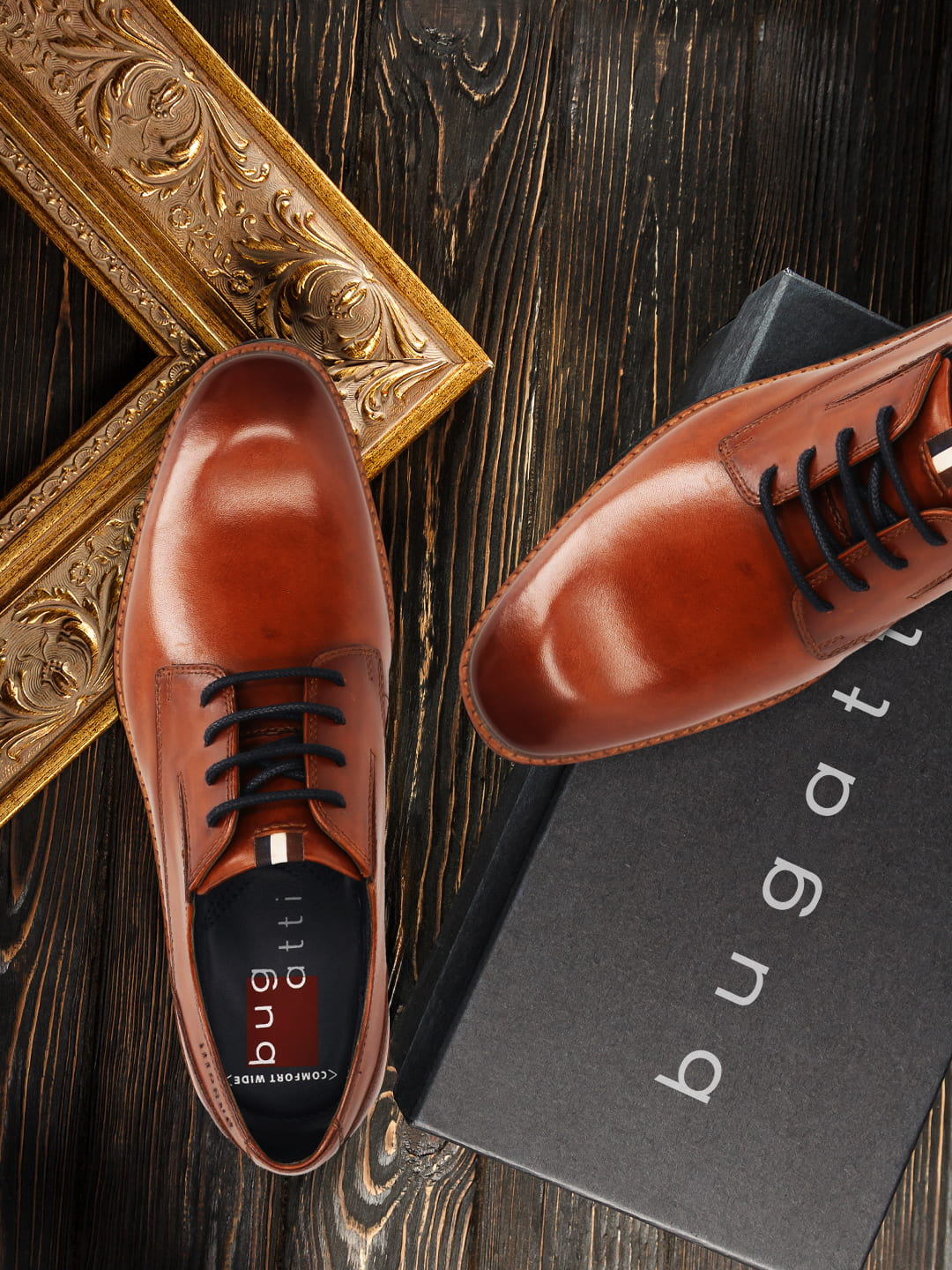 Men's Bugatti derby cognac leather shoes with a round toe and plain toe featuring a stacked heel , a tpr outsole , and laces fastening.