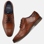 Men's Bugatti derby cognac leather shoes with a pointed toe and plain toe featuring a moulded heel , a tpr outsole , and laces fastening.