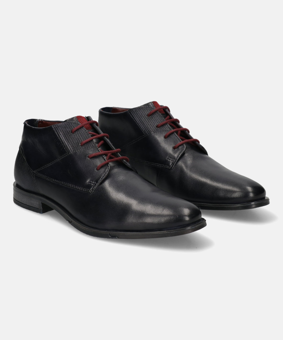 Dark blue leather Chukka boots by bugatti with dark red laces and textured details.