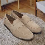 Men's Bugatti penny loafer beige leather shoes with a pointed toe and apron toe featuring a stacked heel , a tpr outsole.