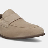 Men's Bugatti penny loafer beige leather shoes with a pointed toe and apron toe featuring a stacked heel , a tpr outsole.