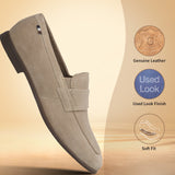 Men's Bugatti penny loafer beige leather shoes with a pointed toe and apron toe featuring a stacked heel , a tpr outsole.