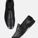 Men's Bugatti penny loafer black leather shoes with a pointed toe and apron toe featuring a stacked heel , a tpr outsole.