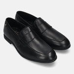 Men's Bugatti penny loafer black leather shoes with a pointed toe and apron toe featuring a stacked heel , a tpr outsole.