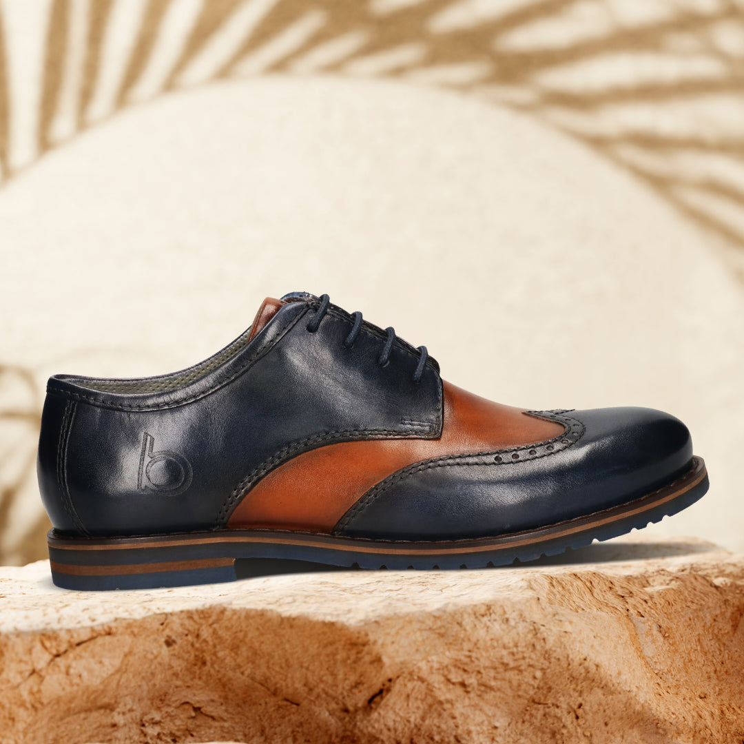 Men's Bugatti derby blue leather shoes with a round toe and wing tip featuring a stacked heel , a eva outsole , and laces fastening.