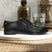 Men's Bugatti derby black leather shoes with a round toe and plain toe featuring a moulded heel , a tpr outsole , and laces fastening.