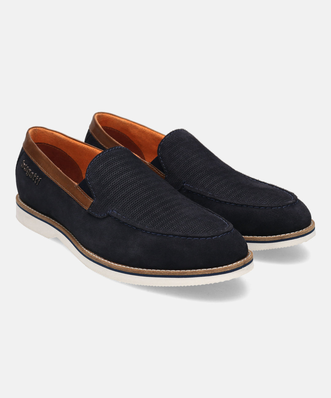 Dark blue premium leather slip-on shoes by Bugatti, with textile panel, brown accents, and white sole.