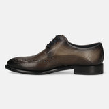 Men's Bugatti derby grey leather shoes with a round toe and wing tip featuring a stacked heel , a leather outsole , and laces fastening.