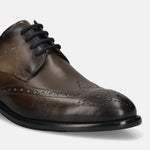 Men's Bugatti derby grey leather shoes with a round toe and wing tip featuring a stacked heel , a leather outsole , and laces fastening.