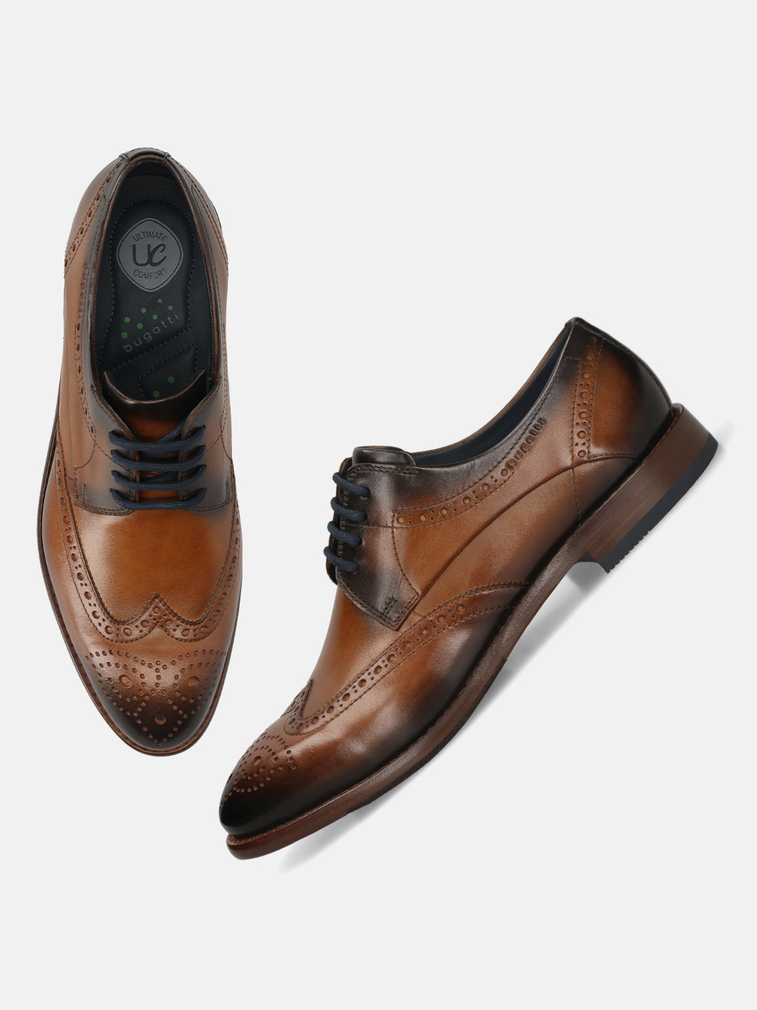 Men's Bugatti derby cognac leather shoes with a round toe and wing tip featuring a stacked heel , a leather outsole , and laces fastening.