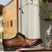 Men's Bugatti derby cognac leather shoes with a round toe and wing tip featuring a stacked heel , a leather outsole , and laces fastening.