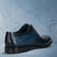 Men's Bugatti derby blue leather shoes with a round toe and wing tip featuring a stacked heel , a leather outsole , and laces fastening.