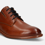 Men's Bugatti derby cognac leather shoes with a round toe and plain toe featuring a stacked heel , a leather outsole , and laces fastening.
