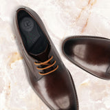 Men's Bugatti derby brown leather shoes with a pointed toe and plain toe featuring a stacked heel , a leather outsole , and laces fastening.