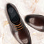 Men's Bugatti derby brown leather shoes with a pointed toe and plain toe featuring a stacked heel , a leather outsole , and laces fastening.