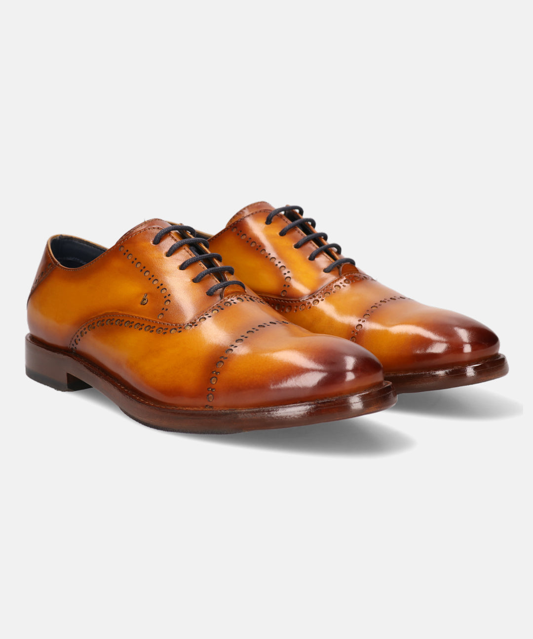 Yellow leather dress shoes by bugatti with black laces, set against a white background.