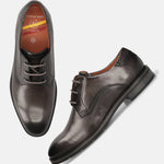 Men's Bugatti derby grey leather shoes with a round toe and plain toe featuring a stacked heel , a tpr outsole , and laces fastening.