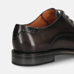 Men's Bugatti derby grey leather shoes with a round toe and plain toe featuring a stacked heel , a tpr outsole , and laces fastening.
