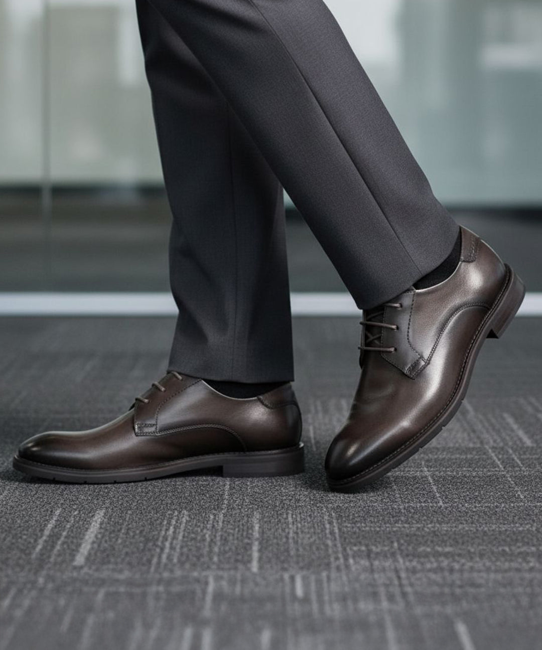 bugatti Laziano Comfort dark grey leather formal shoes worn with grey dress pants.
