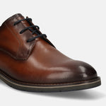 Men's Bugatti derby cognac leather shoes with a round toe and plain toe featuring a stacked heel , a tpr outsole , and laces fastening.