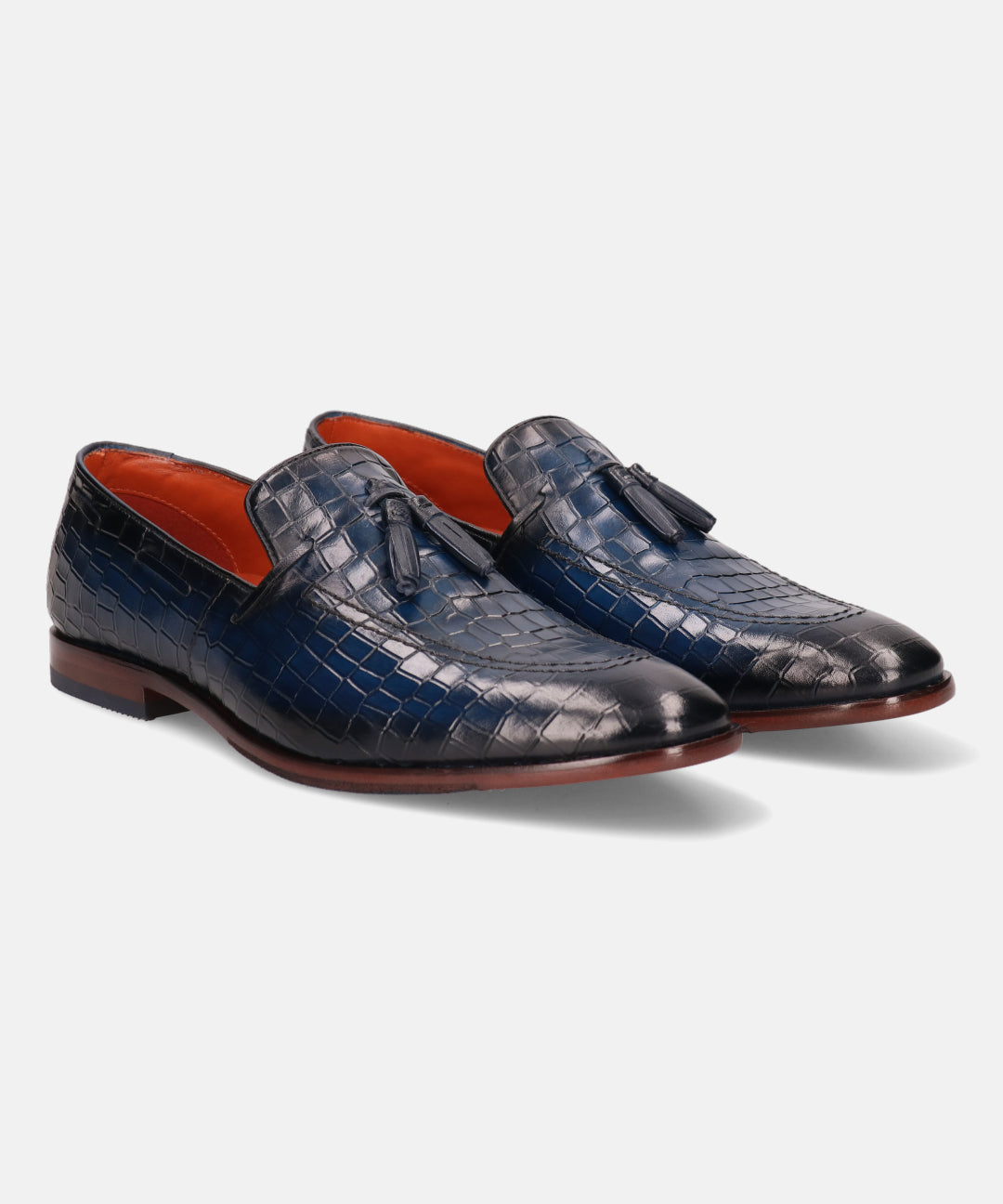 A blue Men's bugatti Tassel Loafers featuring a round toe plain toe, stacked heel. Made from premium genuine leather with a durable leather outsole, this slip-on design offers both style and comfort.