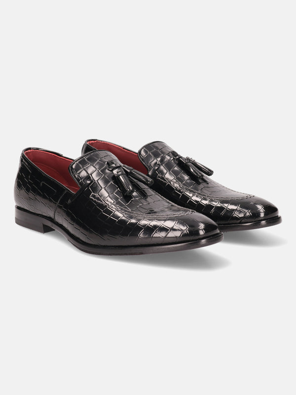 A black Men's bugatti Tassel Loafers featuring a round toe plain toe, stacked heel. Made from premium genuine leather with a durable leather outsole, this slip-on design offers both style and comfort.