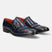 A blue Men's bugatti Kiltie Loafer featuring a round toe wingcap, stacked heel. Made from premium genuine leather with a durable leather outsole, this buckle design offers both style and comfort.