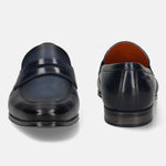 Men's Bugatti penny loafer black leather shoes with a round toe and apron toe featuring a stacked heel , a leather outsole.