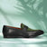 Men's Bugatti penny loafer black leather shoes with a round toe and apron toe featuring a stacked heel , a leather outsole.