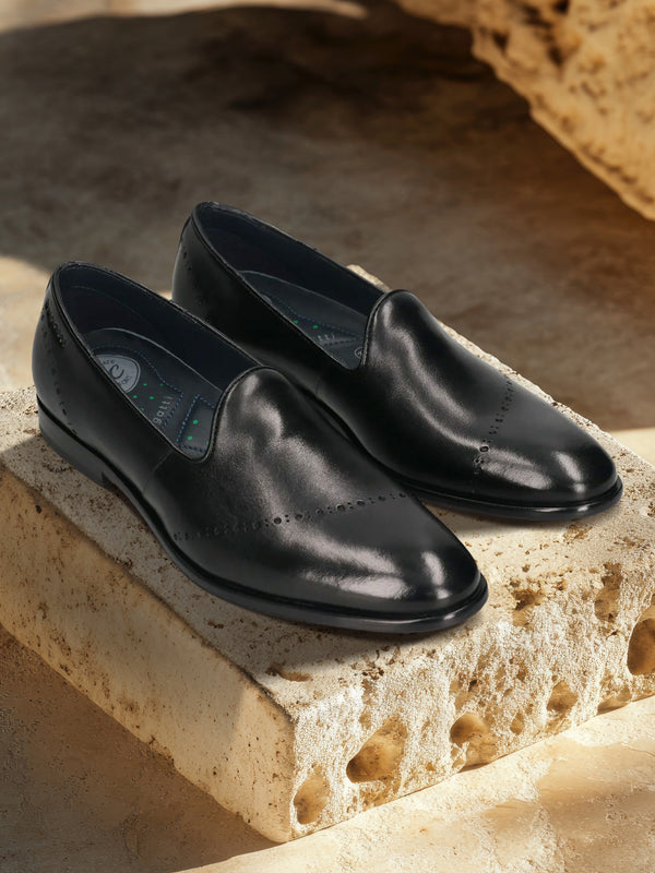 A black Men's bugatti Venetian Loafers featuring a round toe plain toe, stacked heel. Made from premium genuine leather with a durable leather outsole, this slip-on design offers both style and comfort.