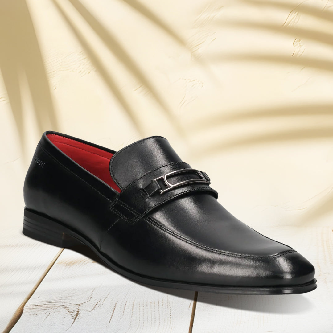 A black Men's bugatti Bit Loafer featuring a round toe apron toe, moulded  heel. Made from premium genuine leather with a durable high quality synthetic outsole, this slip-on design offers both style and comfort.