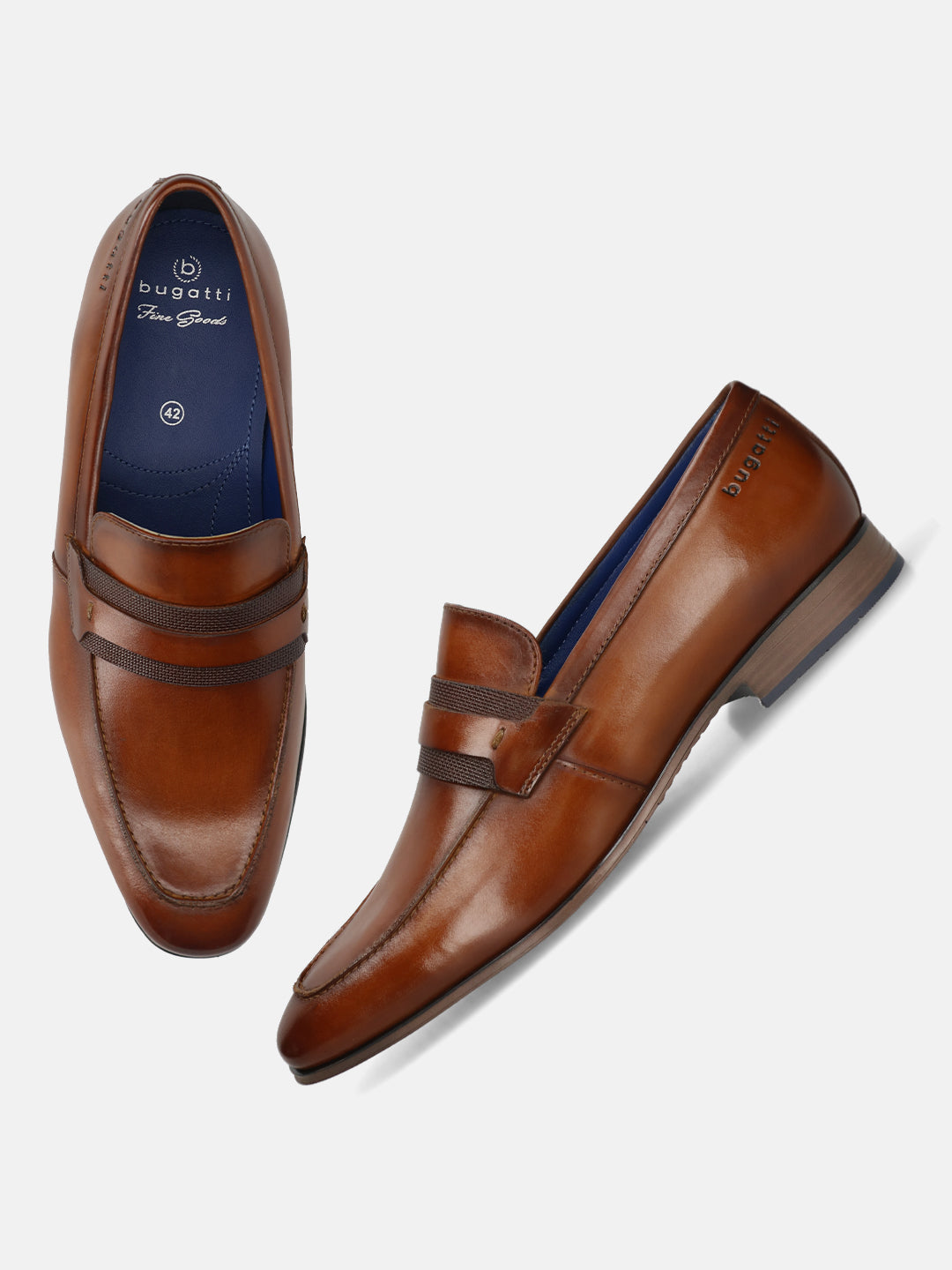 Men's Bugatti penny loafer cognac leather shoes with a round toe and apron toe featuring a moulded heel , a pvc outsole.
