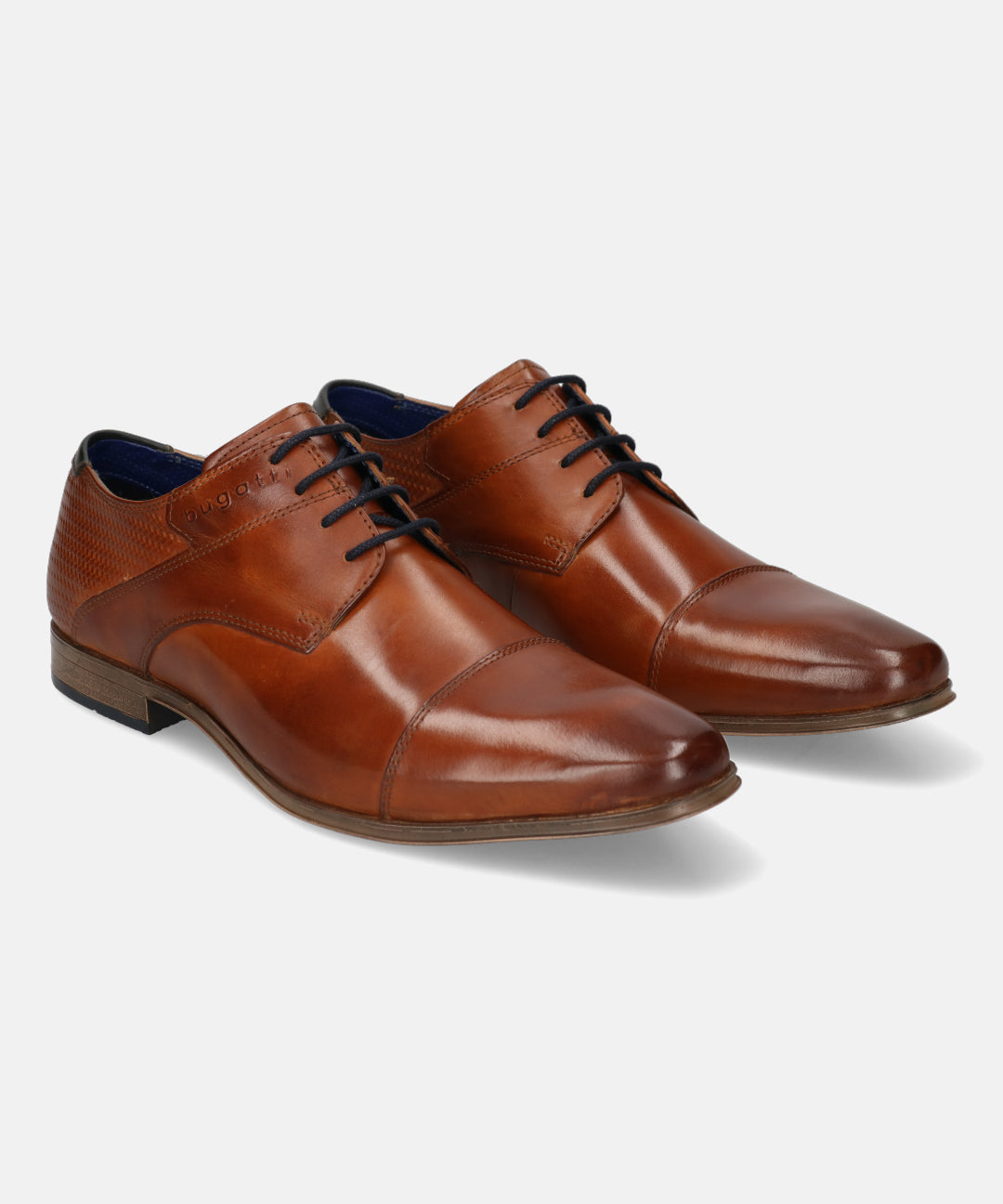 A cognac Men's bugatti Derby featuring a round toe cap toe, stacked heel. Made from premium genuine leather with a durable high quality synthetic outsole, this laces design offers both style and comfort.