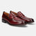 A grey Men's bugatti Penny Loafer featuring a round apron toe, moulded  heel. Made from premium genuine leather with a durable tr outsole, this slip-on design offers both style and comfort.