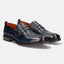 A blue Men's bugatti Penny Loafer featuring a round apron toe, moulded  heel. Made from premium genuine leather with a durable tr outsole, this slip-on design offers both style and comfort.
