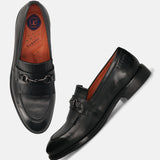Men's Bugatti kiltie loafer black leather shoes with a round toe and apron toe featuring a stacked heel , a leather outsole.