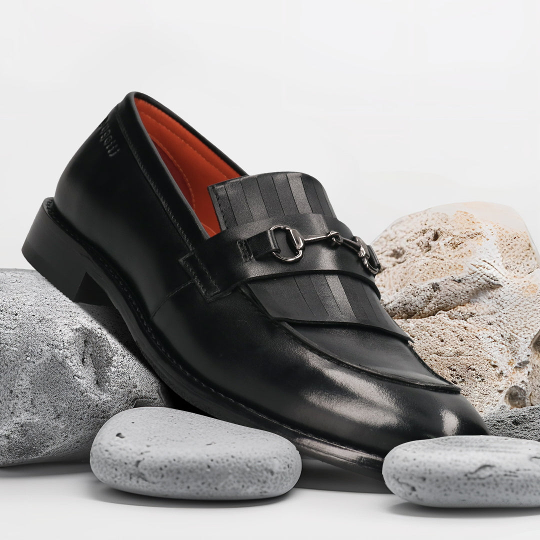 Men's Bugatti kiltie loafer black leather shoes with a round toe and apron toe featuring a stacked heel , a leather outsole.