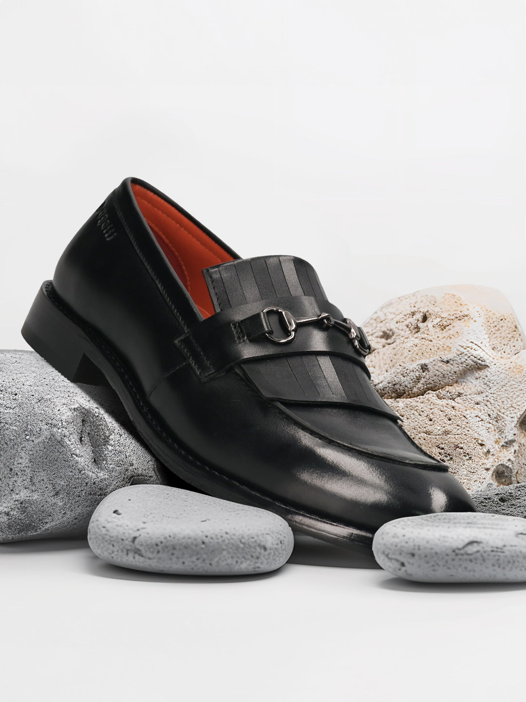 Men's Bugatti kiltie loafer black leather shoes with a round toe and apron toe featuring a stacked heel , a leather outsole.