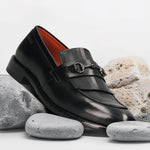 Men's Bugatti kiltie loafer black leather shoes with a round toe and apron toe featuring a stacked heel , a leather outsole.