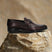 A grey Men's bugatti Bit Loafer featuring a round toe apron toe, stacked heel. Made from premium genuine leather with a durable leather outsole, this slip-on design offers both style and comfort.