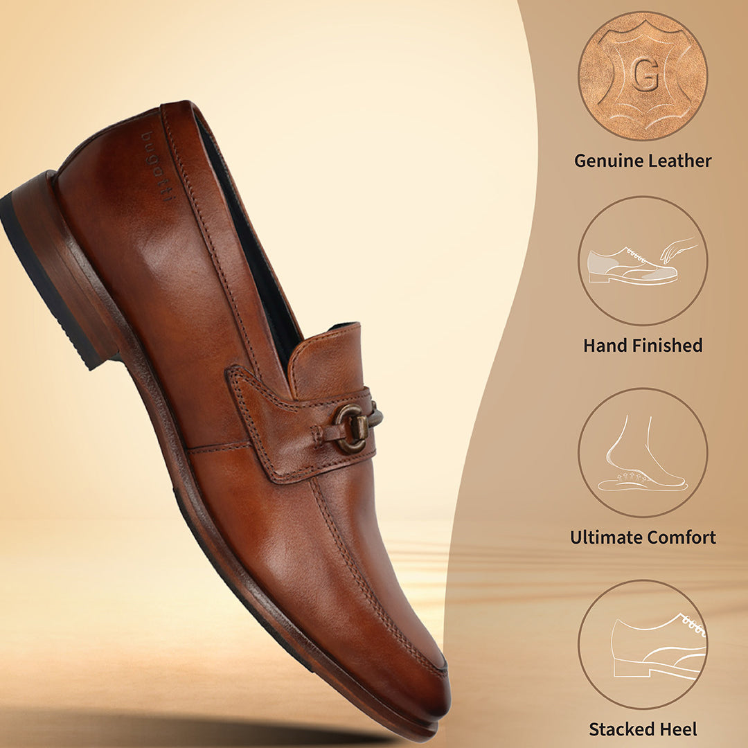 A cognac Men's bugatti Bit Loafer featuring a round toe apron toe, stacked heel. Made from premium genuine leather with a durable leather outsole, this slip-on design offers both style and comfort.