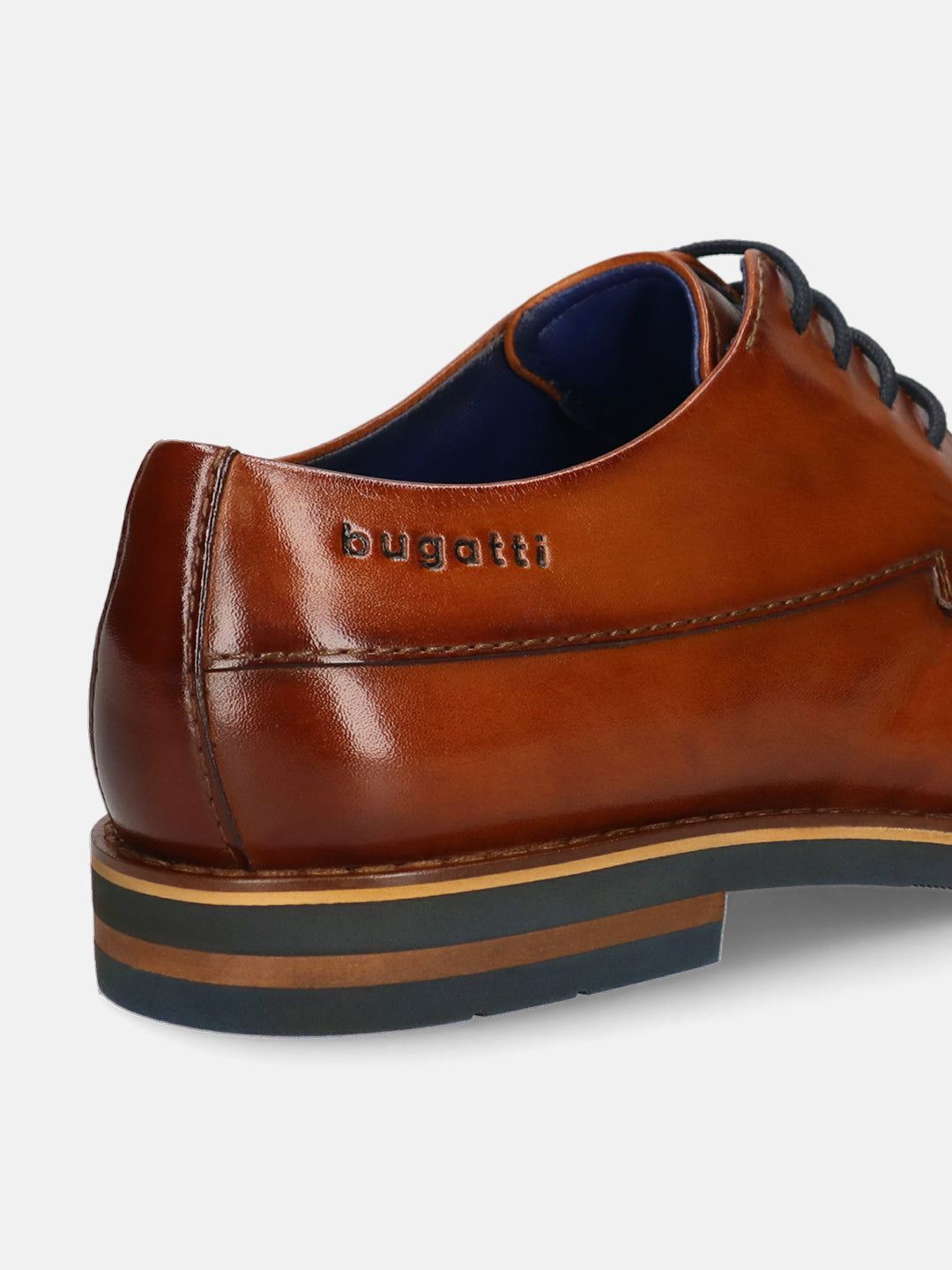 Men's Bugatti derby cognac leather shoes with a round toe and wing tip featuring a stacked heel , a eva outsole , and laces fastening.